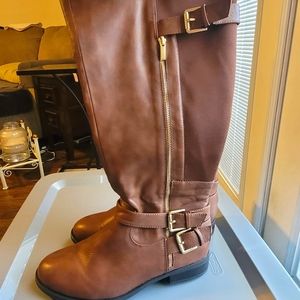 Torrid brown knee high boots. Faux leather with gold hardware. Size 11
